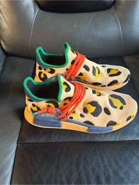 Adidas Men's x Pharrell Hu NMD 'Animal Print' sneaker. 